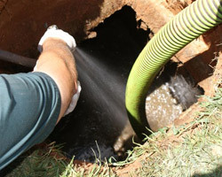 How a Septic Tank Cleaning Company in Lapeer, MI, Can Prevent Plumbing Disasters