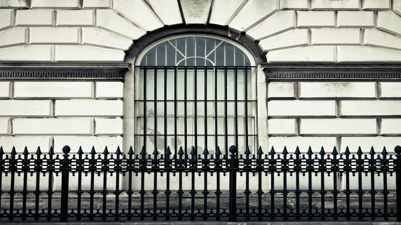 20389647 – window arch and bars in a london mansion