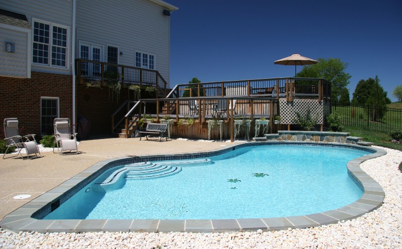 Features To Consider When Designing An Outdoor Living Pool And Patio