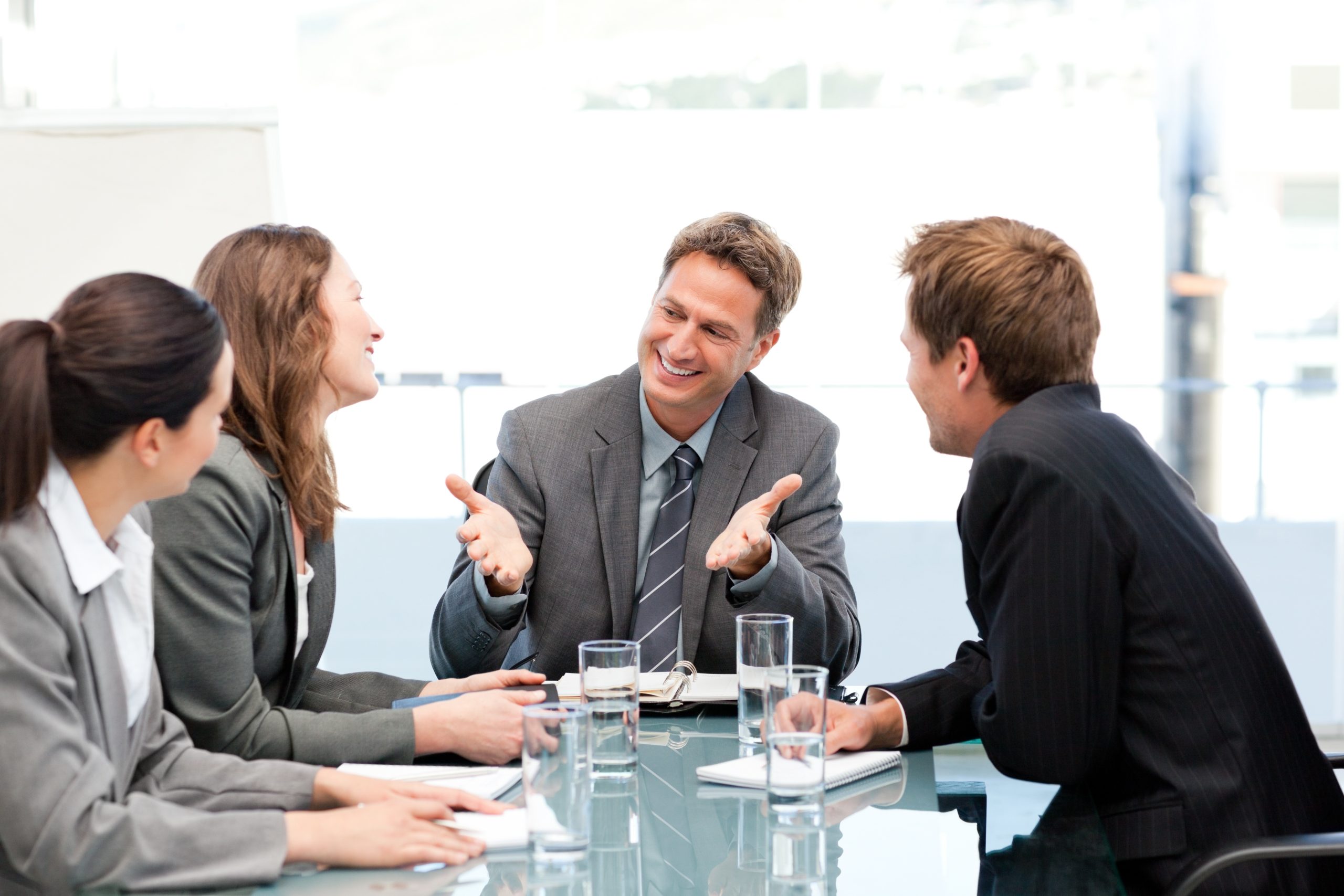 10183484 – happy team laughing together at a meeting